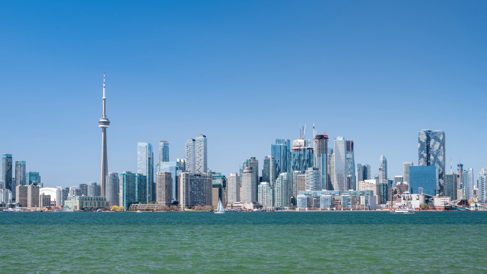 Views makes Toronto iconography global: CN Tower scale, winter palette, and city-as-brand.